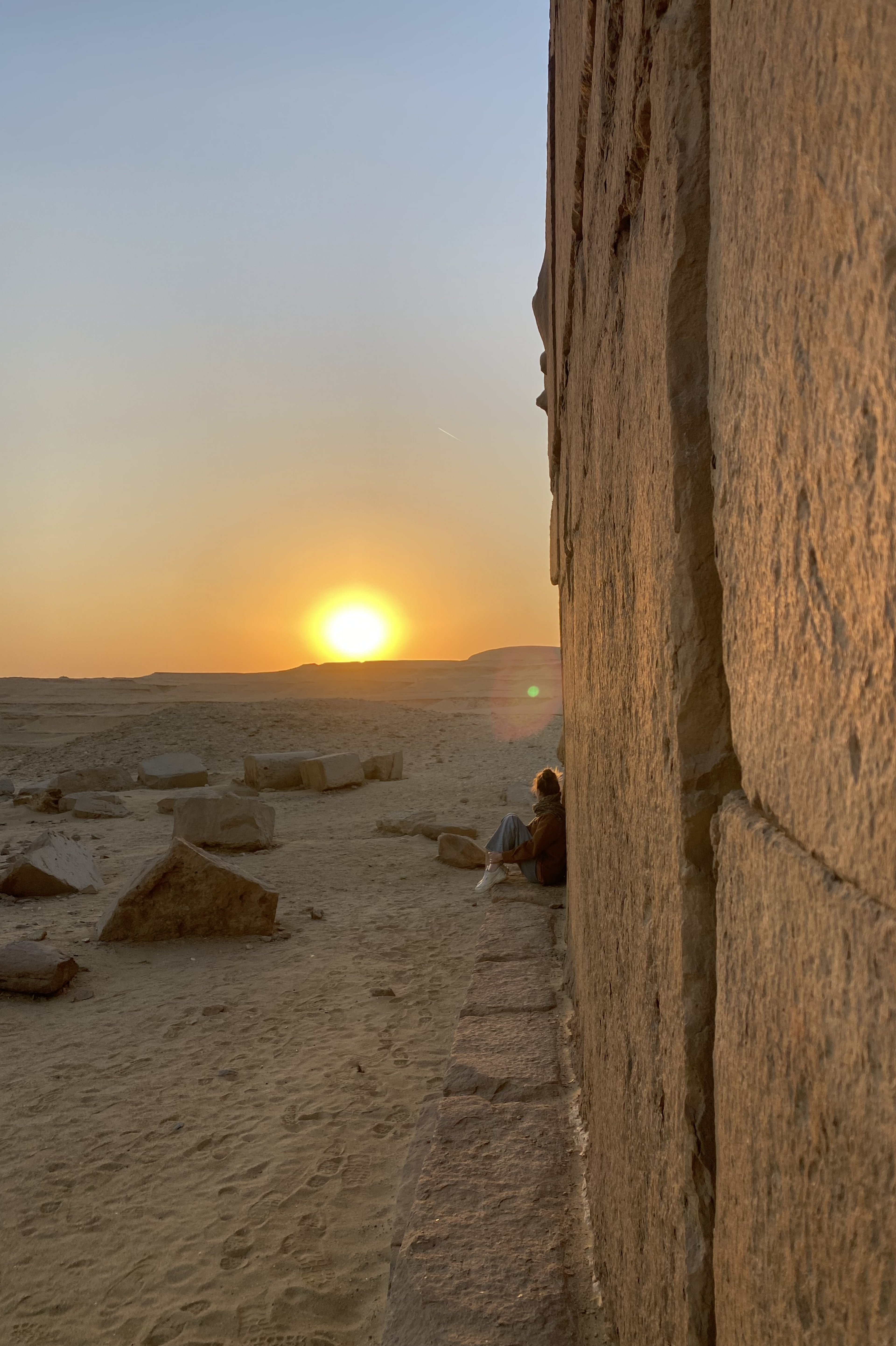 Sunset by ancient stones in Egypt